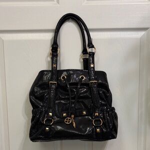 IMAN Elegant Black and Gold Shoulder Bag